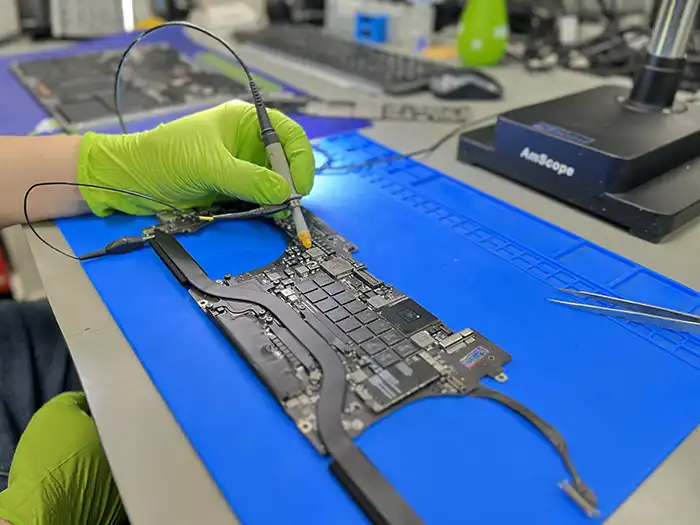 Component-level repair on a laptop logic board